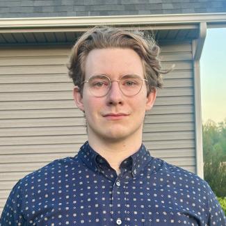Portrait picture of Andrew Holland, Ph.D. student in the CoRe Flow Lab